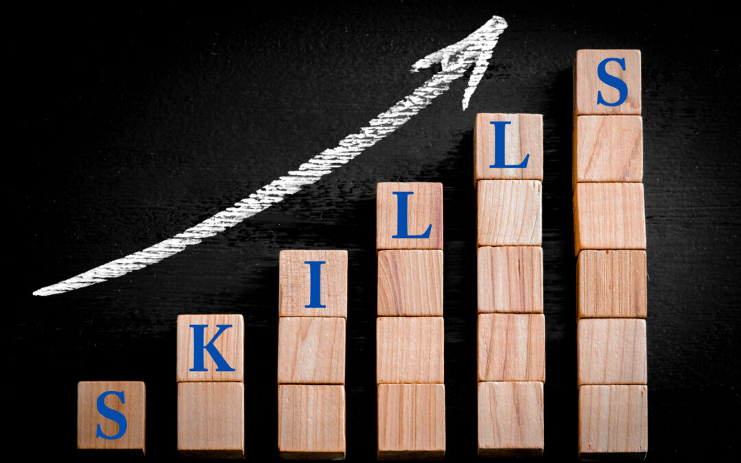 Word SKILLS on ascending arrow above bar graph demonstrates upskilling which can lead to confident interviewing