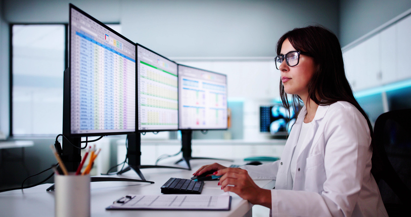 Female working on spreadsheets